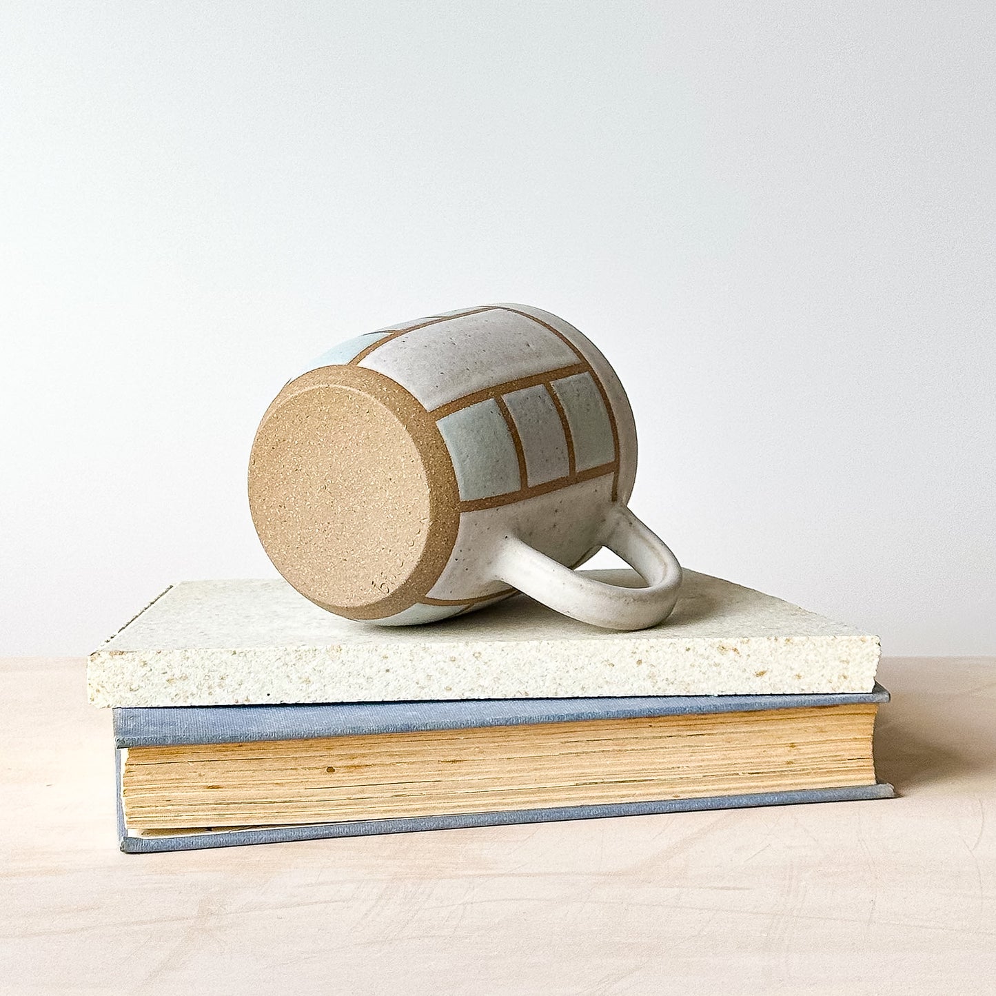 A view of the base of a geometric styled mug